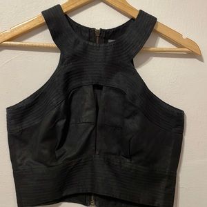 Sheike black fitted crop top. Beautiful stitching. Brass zip, Small